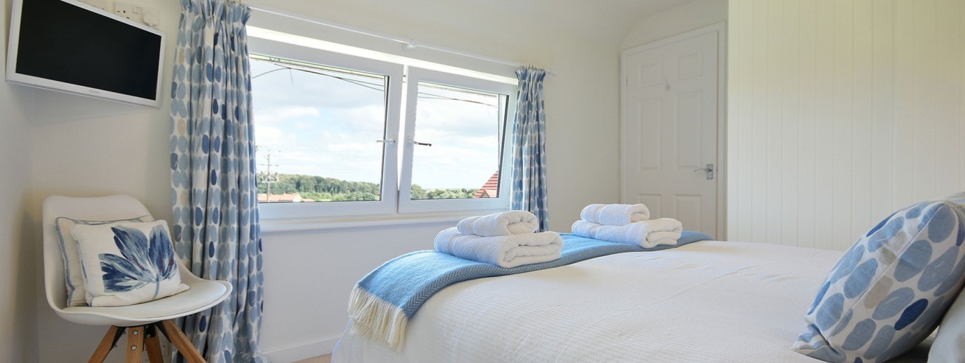 Dunford Cottage king size master bedroom with view